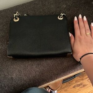 Small black satchel for night